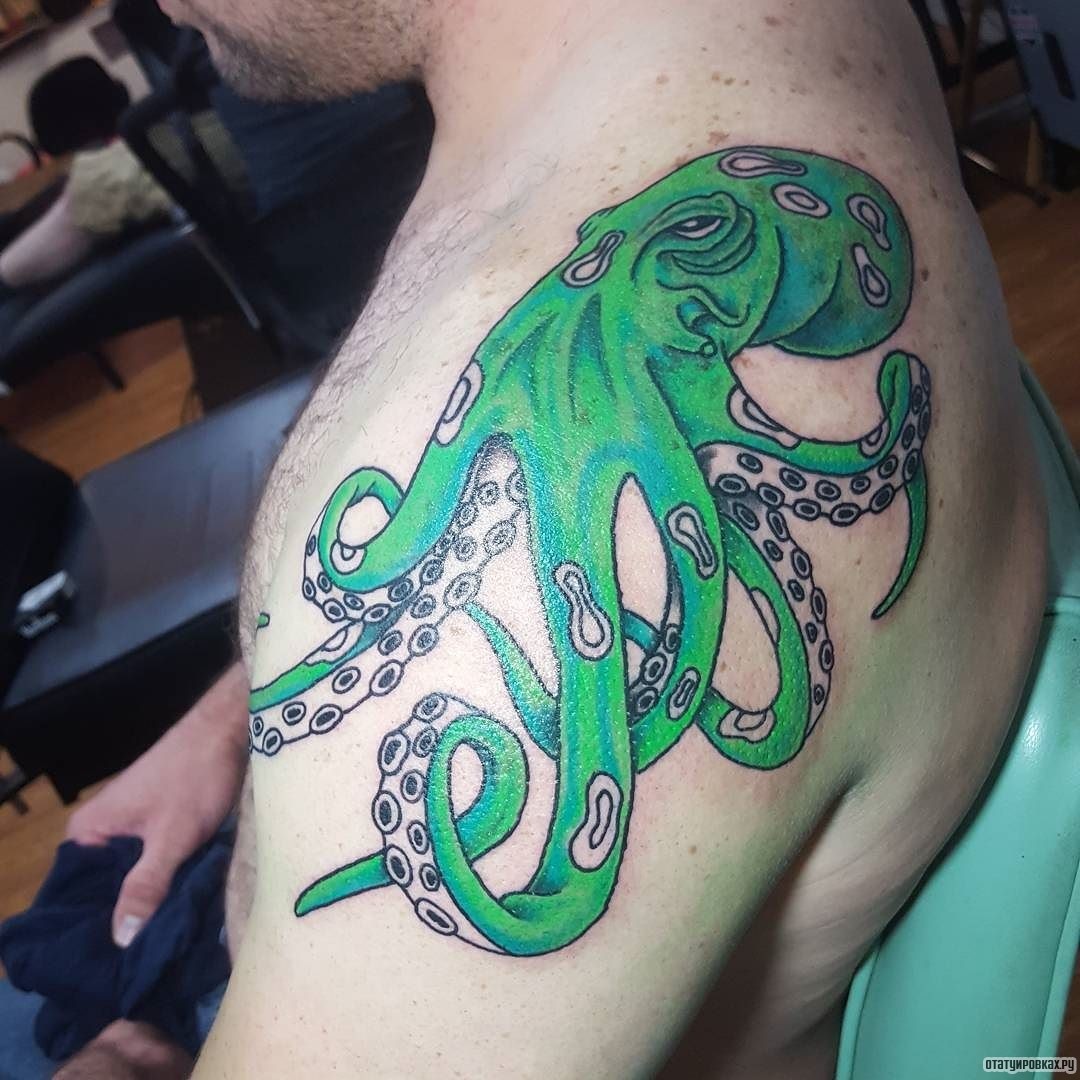 Фотография татуировки под названием «Зеленый осьминог»