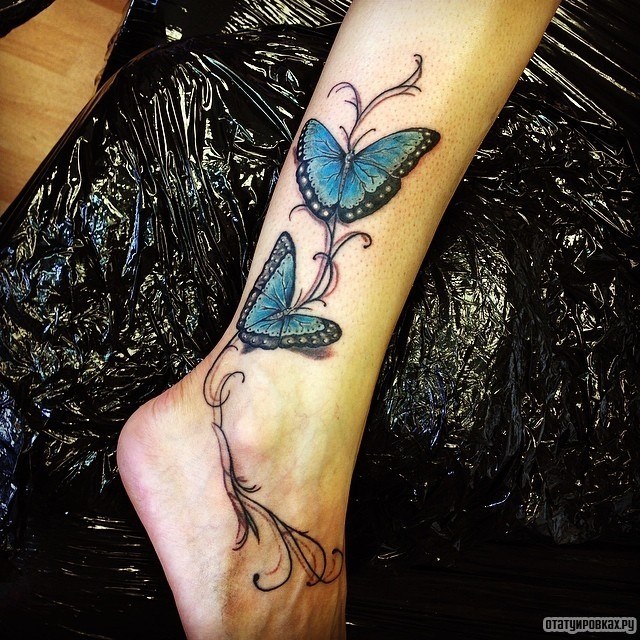 Фотография татуировки под названием «Две голубых бабочки»