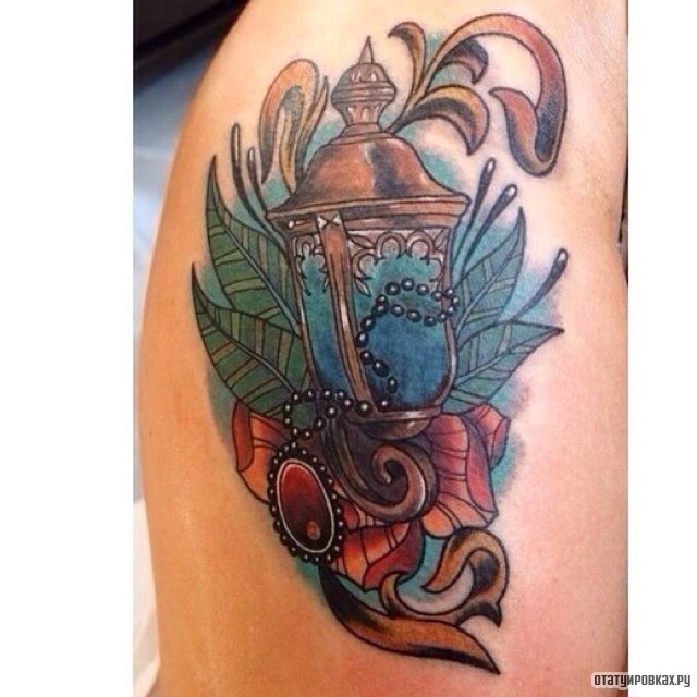 Фотография татуировки под названием «Светильник»