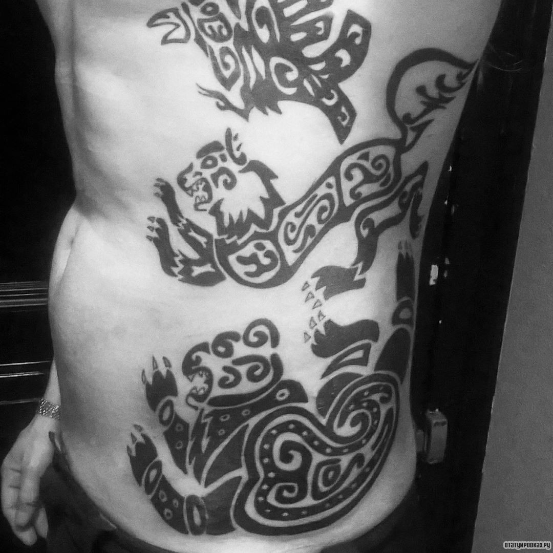 Фотография татуировки под названием «Скифский узор: медведь, лев, птица»