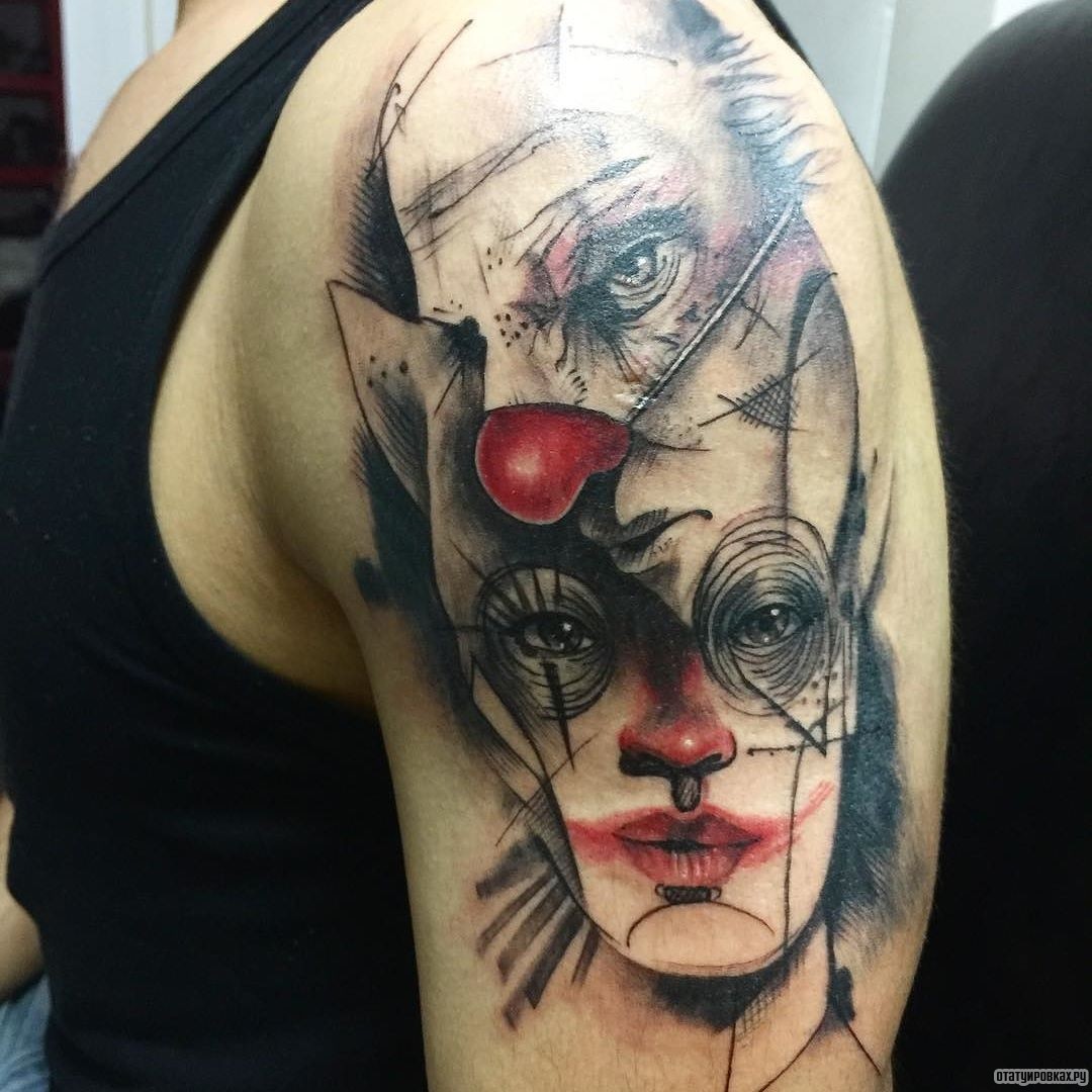 Фотография татуировки под названием «Две маски клоуна»