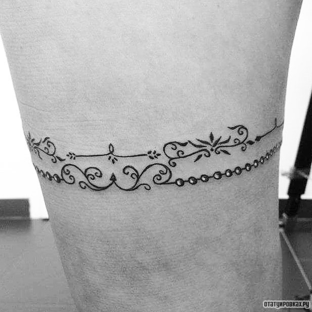 Фотография татуировки под названием «Тонкая подвязка»