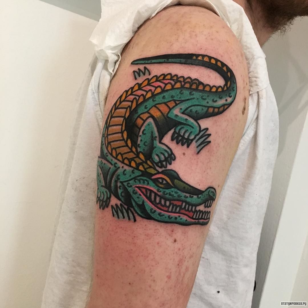 Фотография татуировки под названием «Зеленый крокодил»
