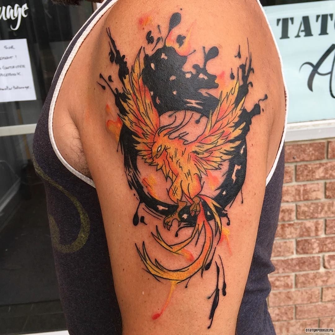 Фотография татуировки под названием «Жар птица с черным кругом»