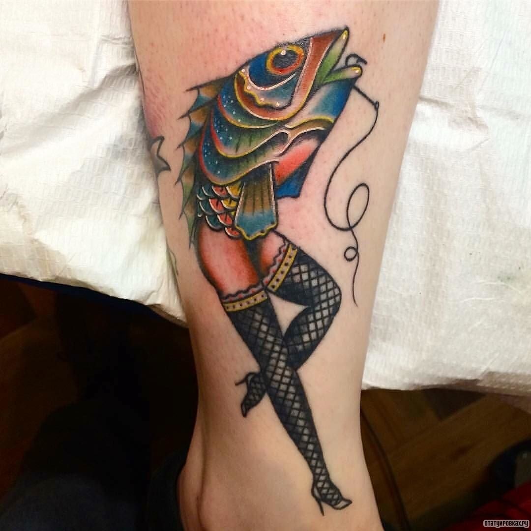 Фотография татуировки под названием «Русалка с головой рыбы»