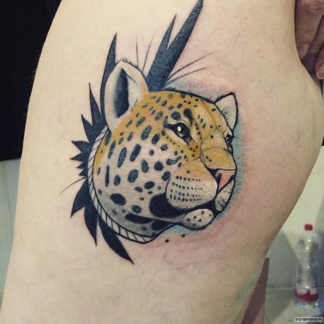 Фотография татуировки под названием «Леопард - голова»