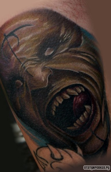 Фотография татуировки под названием «Демон с открытой пастью»