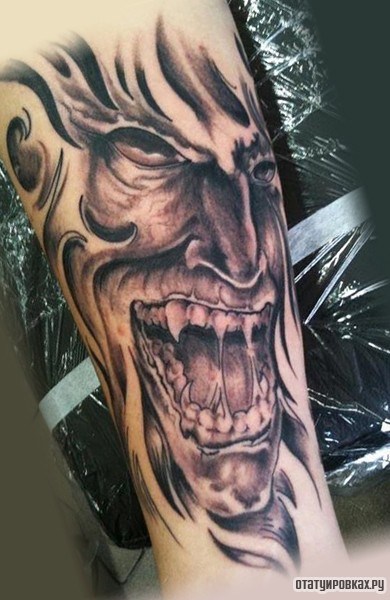 Фотография татуировки под названием «Хитрый демон с пастью»