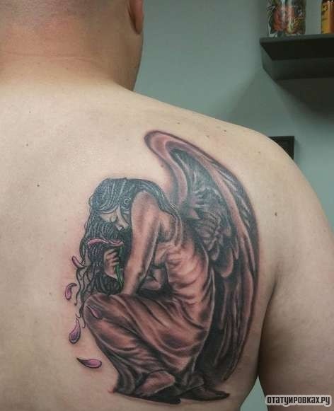 Фотография татуировки под названием «Девушка ангел в печали»