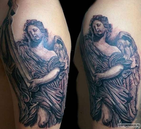 Фотография татуировки под названием «Ангел с тенями»