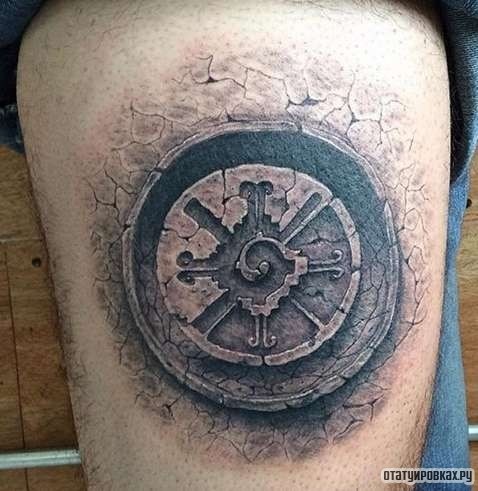 Фотография татуировки под названием «Символ»
