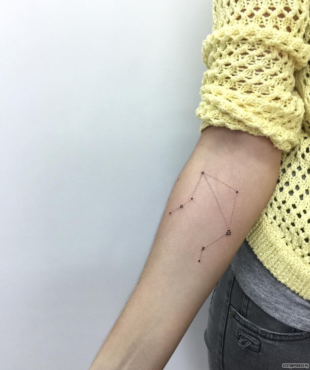 Фотография татуировки под названием «Точечный узор»