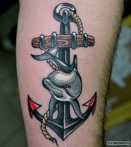 Фотография татуировки под названием «Якорь с дельфином»