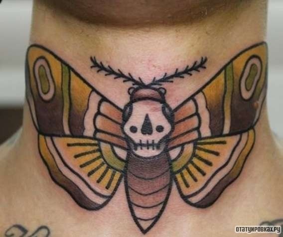 Фотография татуировки под названием «Жук скарабей»