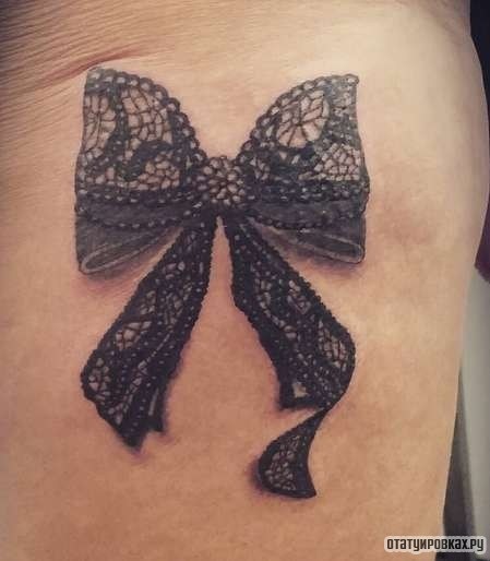 Фотография татуировки под названием «Бантик ажурный»