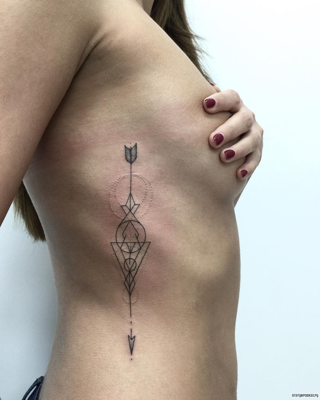 Фотография татуировки под названием «Узор с геометрией»