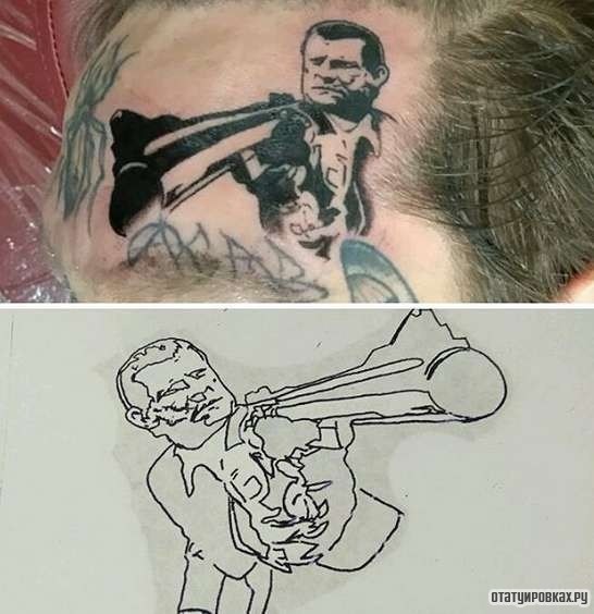Фотография татуировки под названием «Человек с пистолетом»