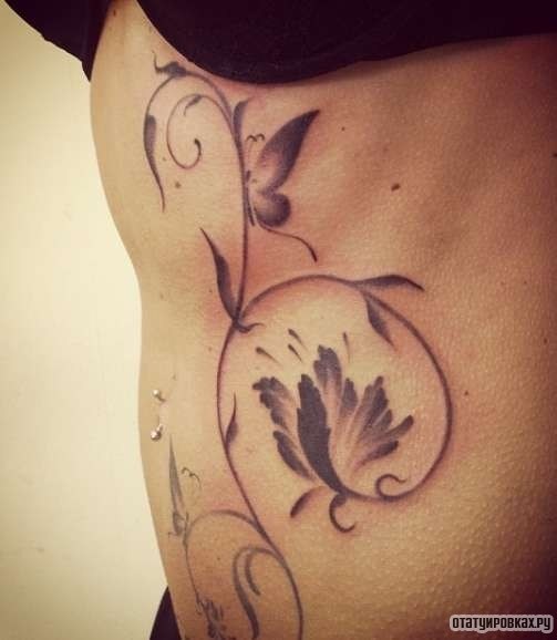 Фотография татуировки под названием «Цветочный узор»