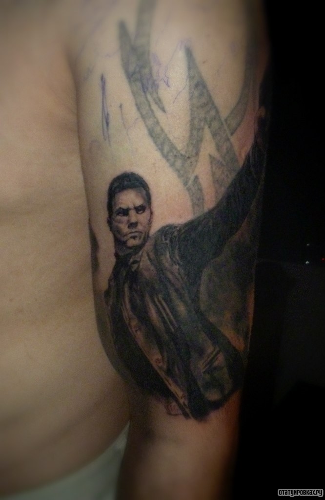Фотография татуировки под названием «Человек»