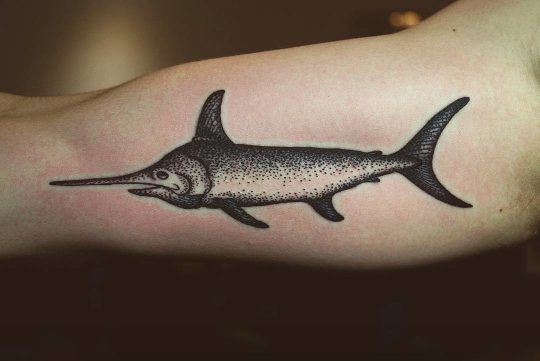 Фотография татуировки под названием «Рыба пила»