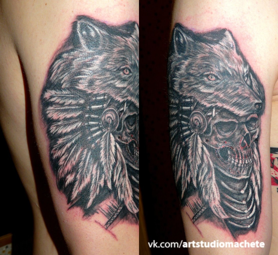 Фотография татуировки под названием «Череп с волком на голове»