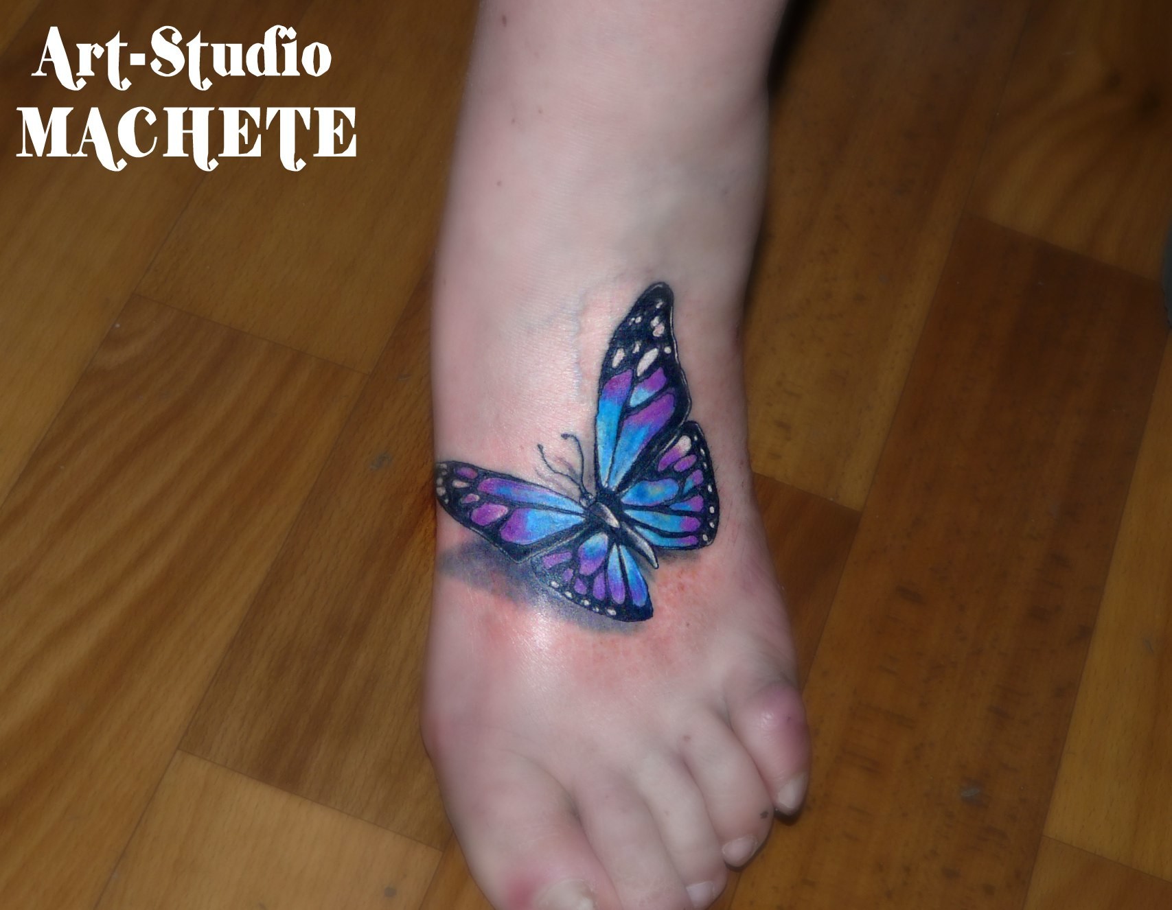 Фотография татуировки под названием «Бабочка 3д»