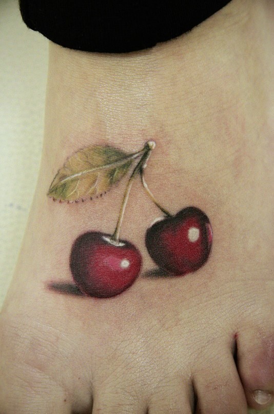 Фотография татуировки под названием «Ягоды вишни»