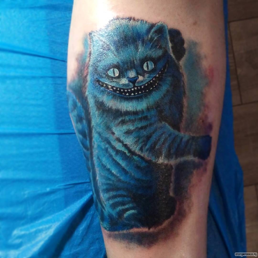 Фотография татуировки под названием «Чеширский кот синий»