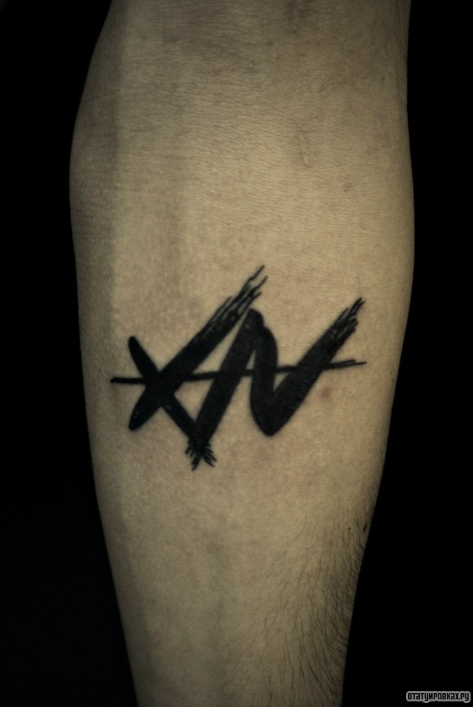 Фотография татуировки под названием «X v»