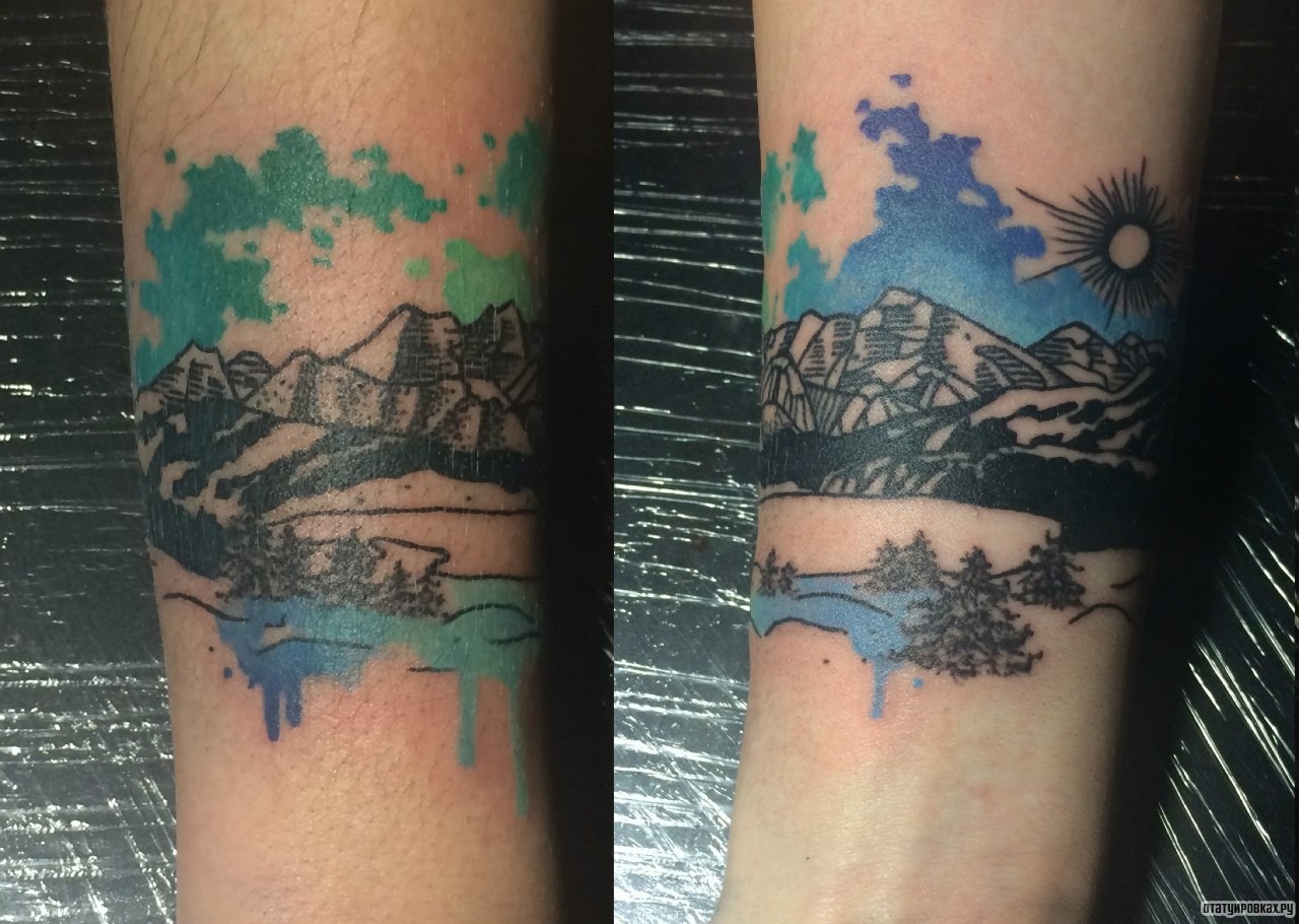 Фотография татуировки под названием «Горы и солнце»
