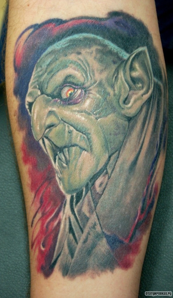 Фотография татуировки под названием «Ужасный человек»