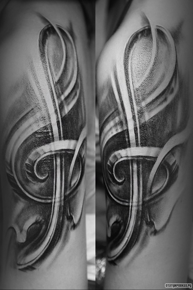Фотография татуировки под названием «Скрипичный ключ»
