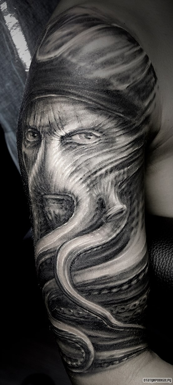 Фотография татуировки под названием «Осьминог с глазами»
