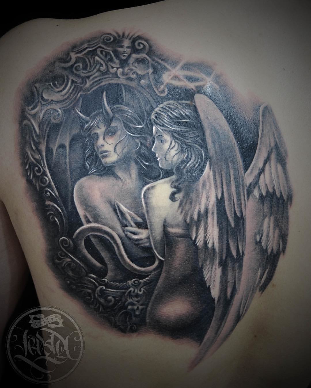 Фотография татуировки под названием «Ангел-демон»