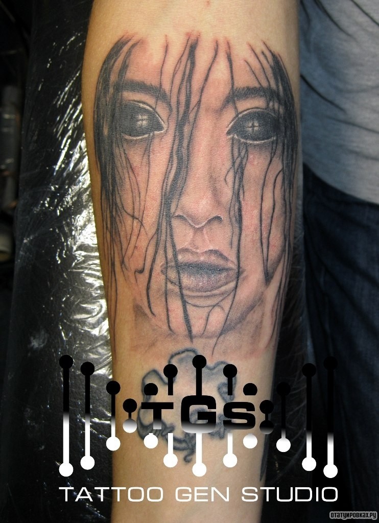 Фотография татуировки под названием «Лицо девушки»