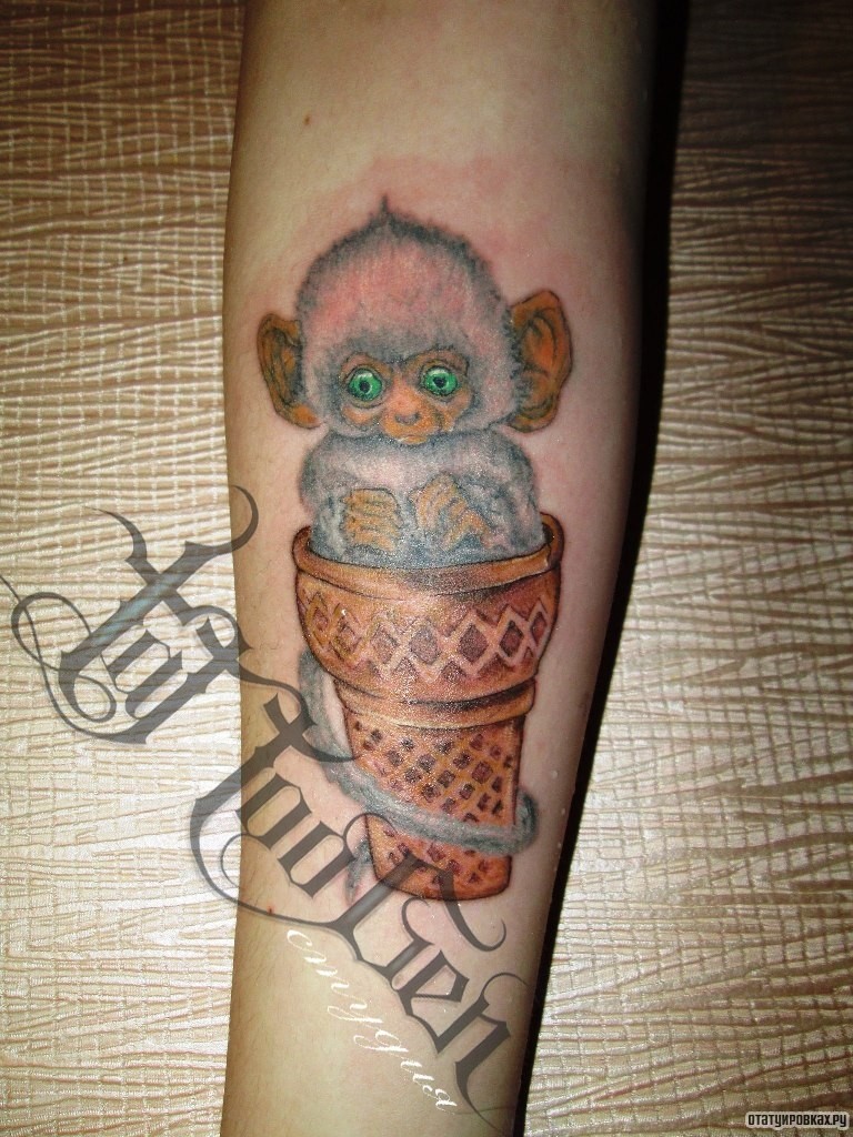 Фотография татуировки под названием «Маленькая обезьянка»