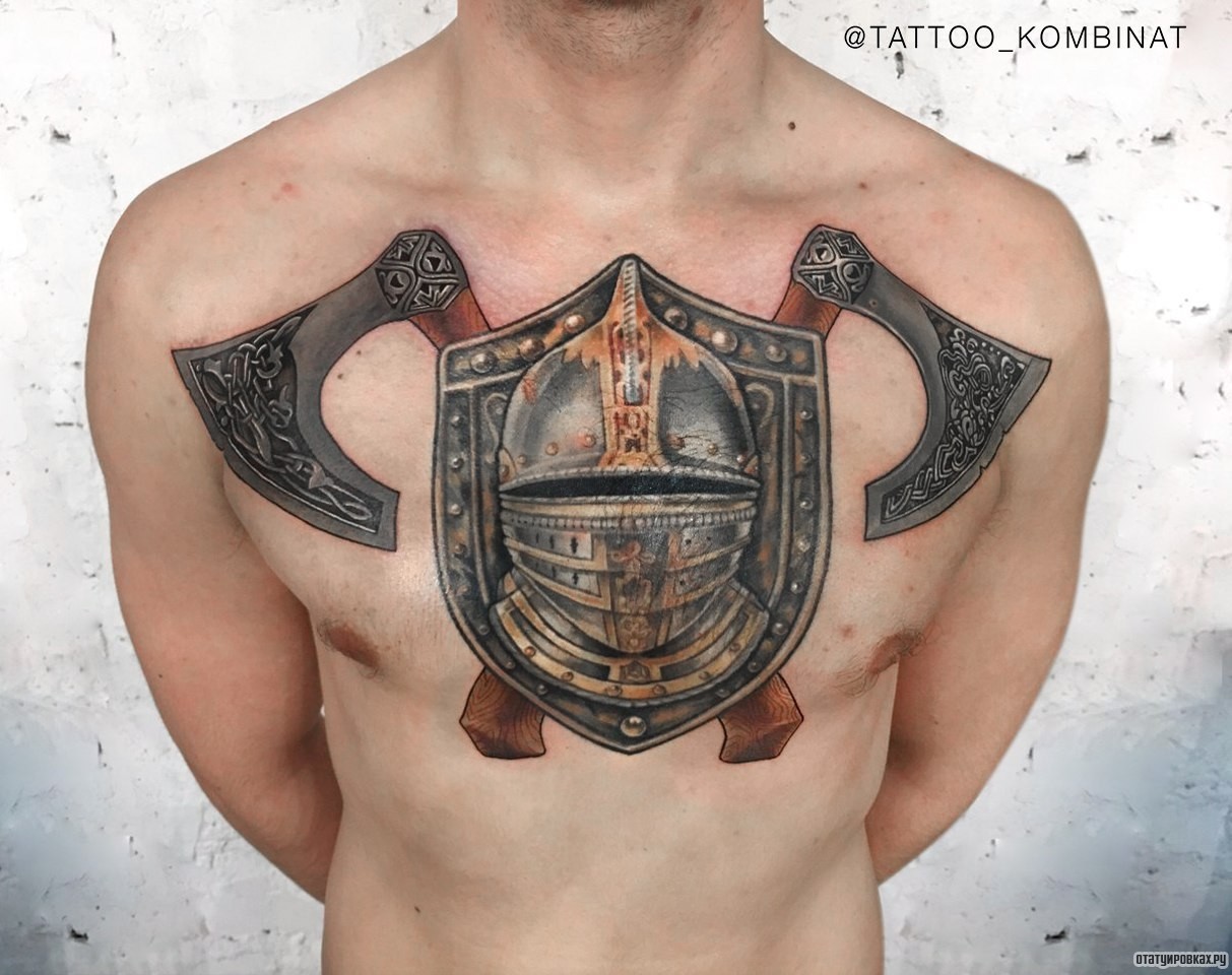 Фотография татуировки под названием «Два топора и щит»