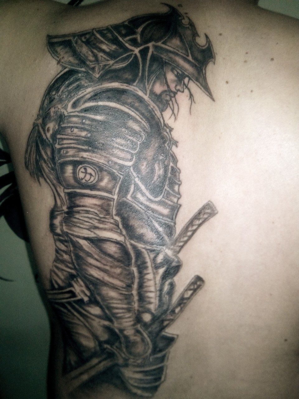 Фотография татуировки под названием «самурай»
