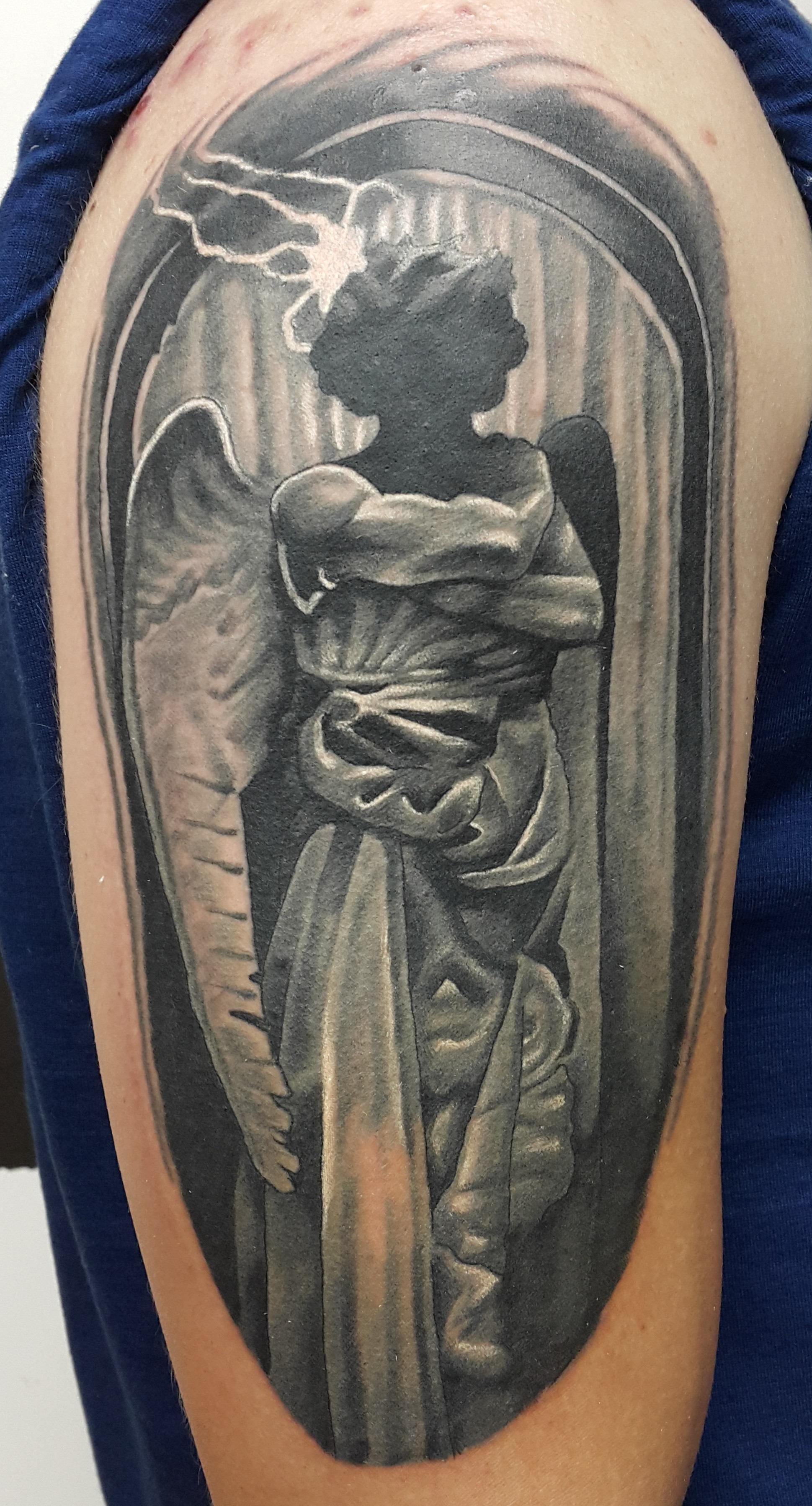 Фотография татуировки под названием «Темный ангел»