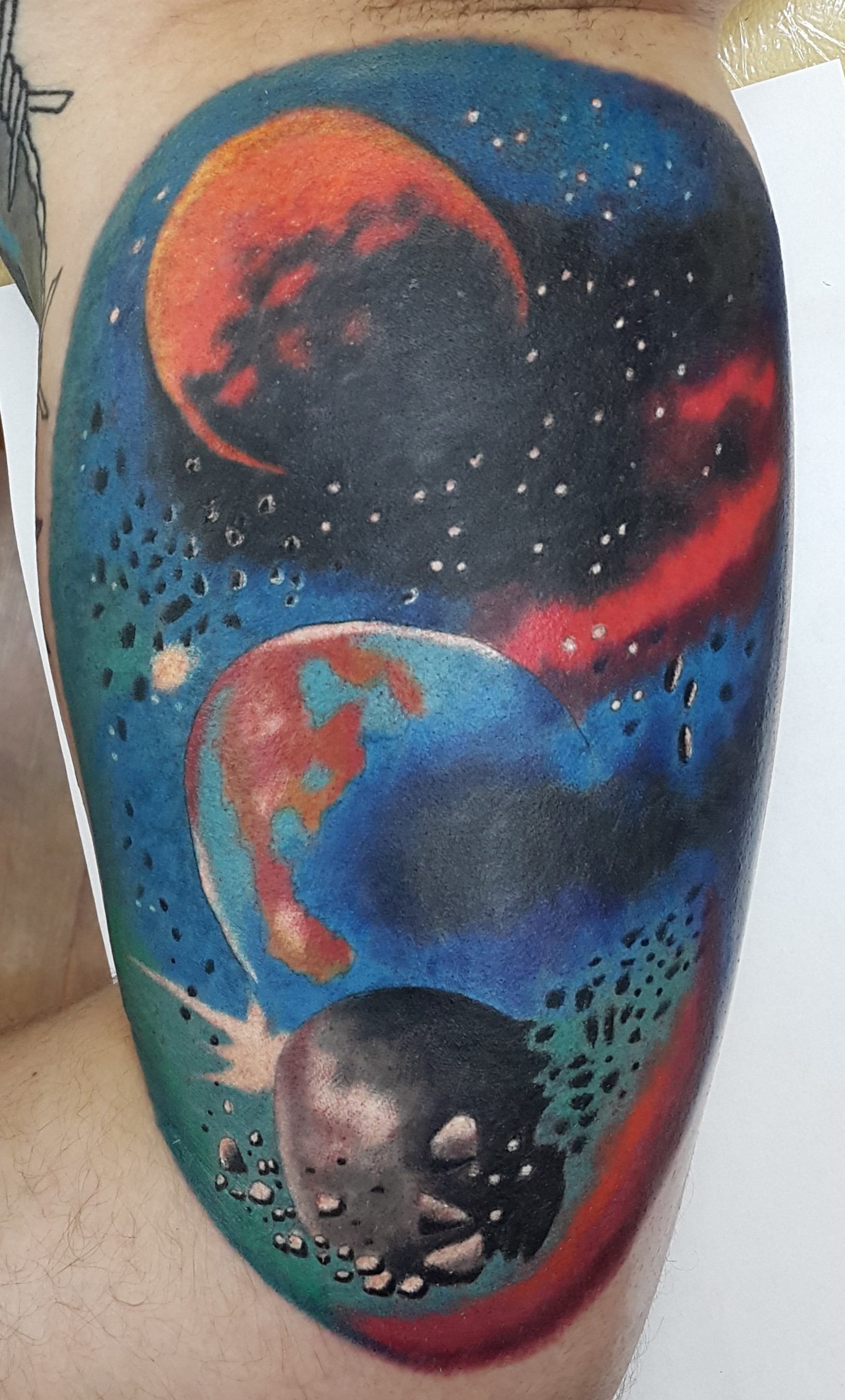 Фотография татуировки под названием «Космос»