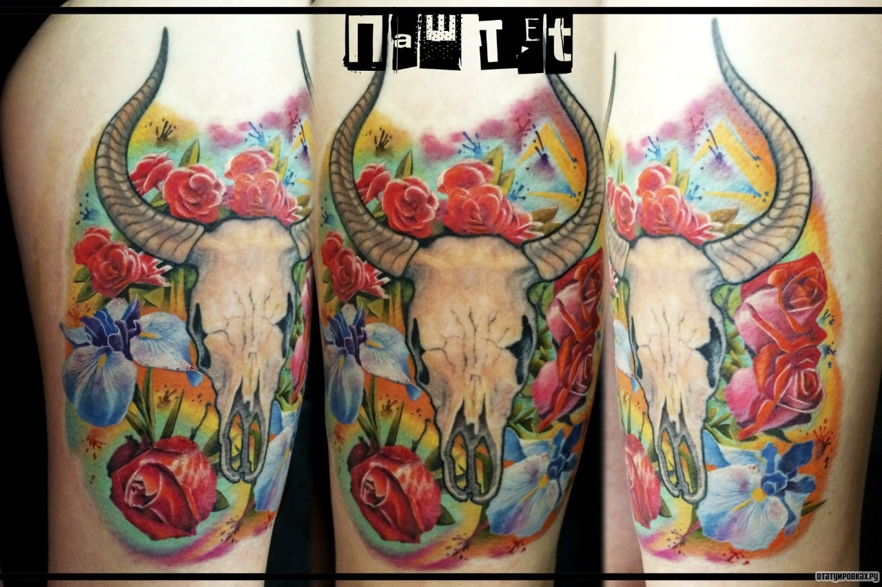 Фотография татуировки под названием «Череп животного с орхидеей и розой»