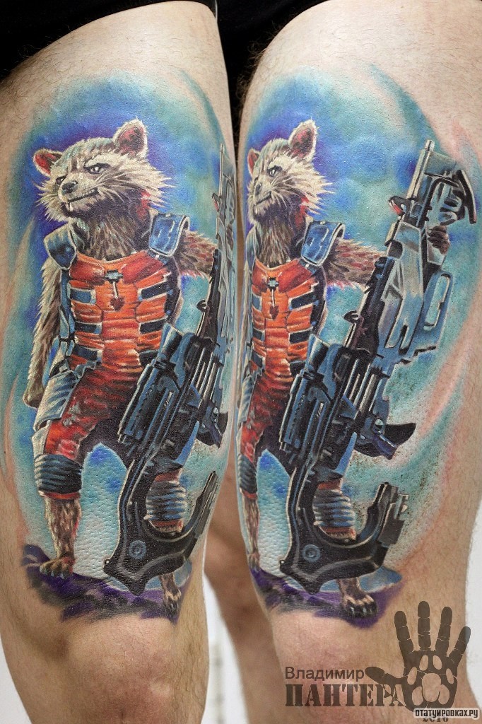 Фотография татуировки под названием «Мультяшный кот с оружием»