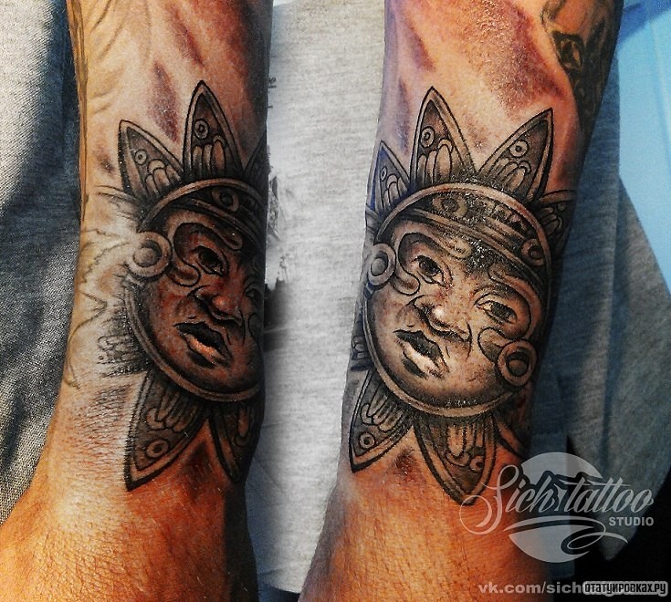 Фотография татуировки под названием «Солнце ра с лицом»
