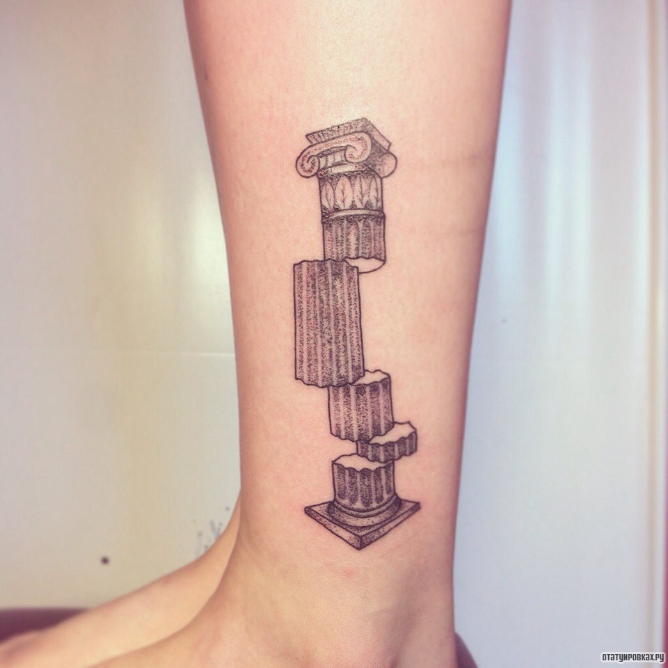 Фотография татуировки под названием «Башня на кусочки»