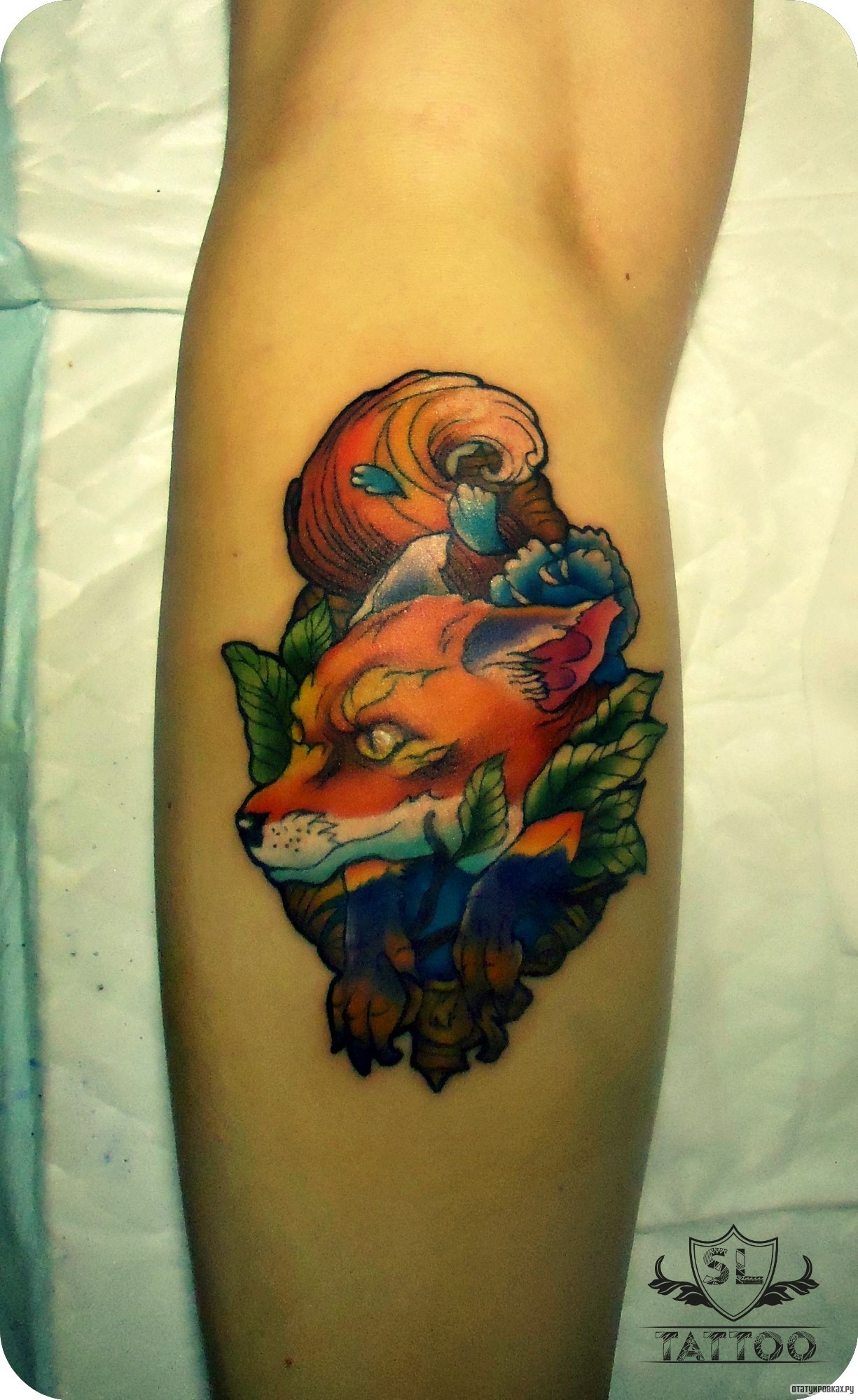 Фотография татуировки под названием «Лиса и листья»