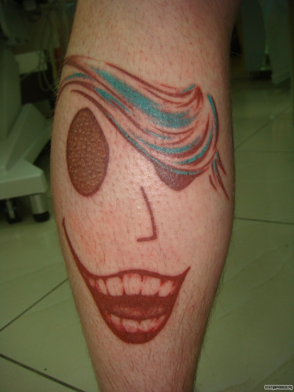 Фотография татуировки под названием «Физиономия лица»