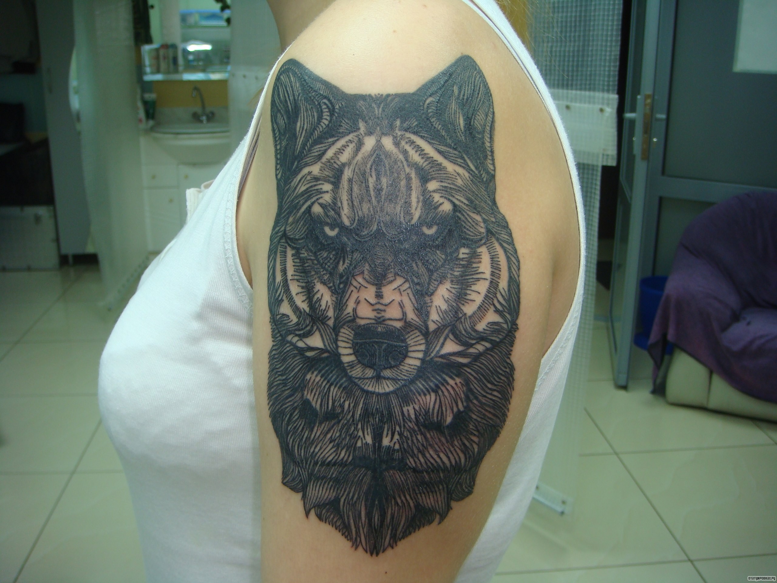 Фотография татуировки под названием «Волк графика»