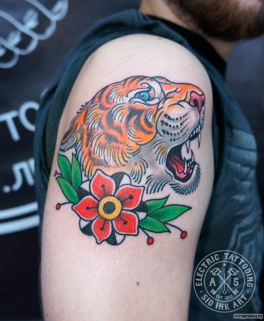 Фотография татуировки под названием «Тигр и цветок»