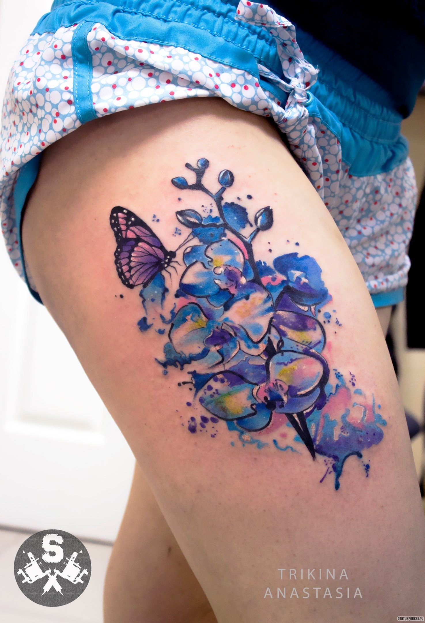 Фотография татуировки под названием «Орхидея с бабочкой»