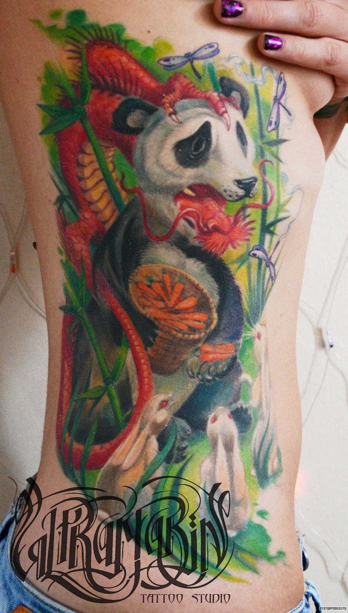 Фотография татуировки под названием «Панда дракон»